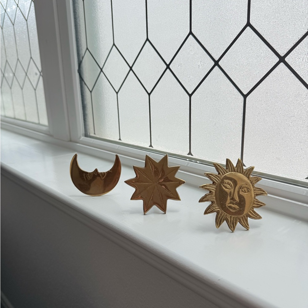 Anthropologie Gold Sun, Star, and Moon curtain tie backs